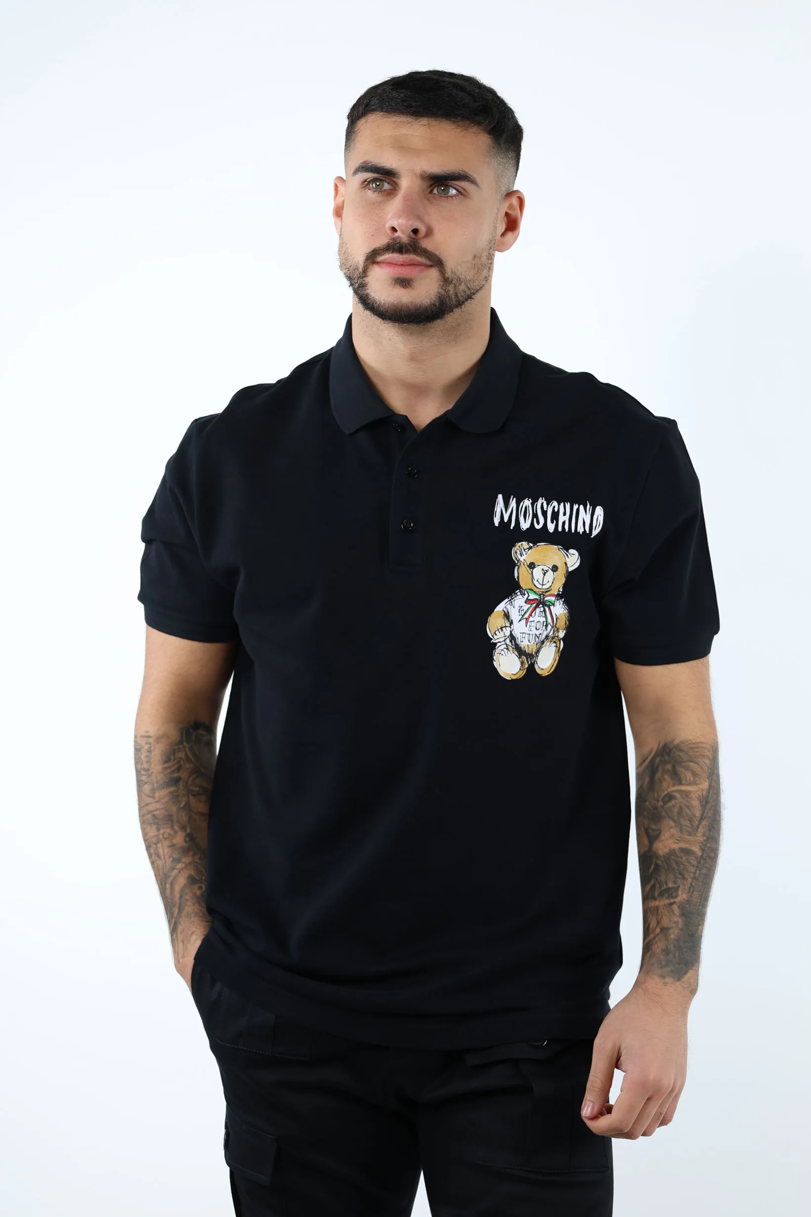 Polo negro con minilogo oso dibujo