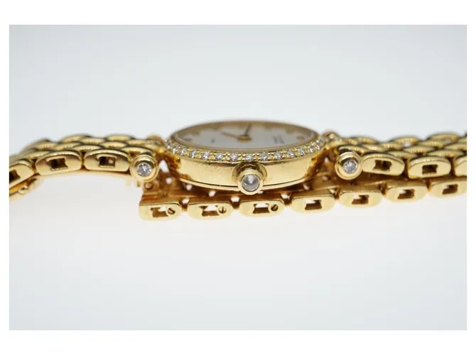 Reloj Van Cleef & Arpels con esfera de diamantes blancos y bisel de diamantes Dorado Gold hardware 